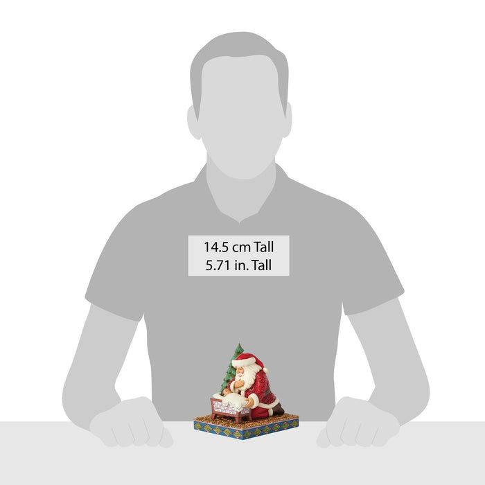 Enesco Santa Kneeling Over Baby Jesus