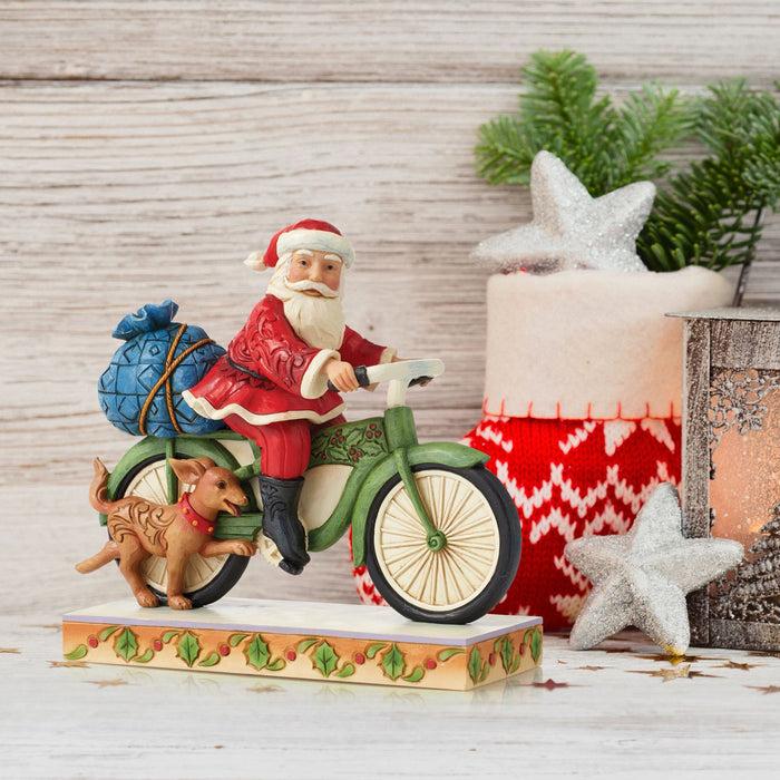 Enesco Santa Riding Bicycle