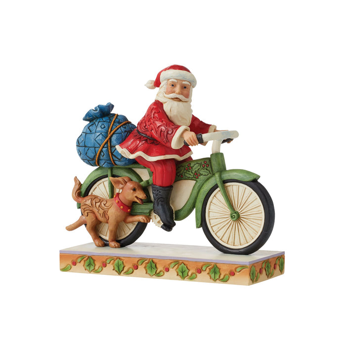 Enesco Santa Riding Bicycle