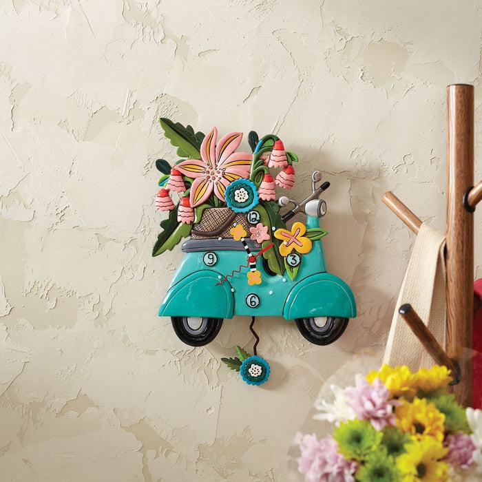 Enesco Scoot-In Through Life Clock