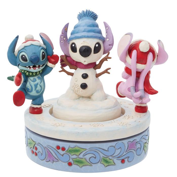 Enesco Stitch & Angel Building A Snow