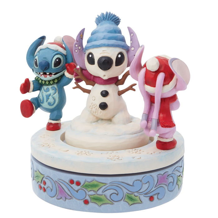 Enesco Stitch & Angel Building A Snow